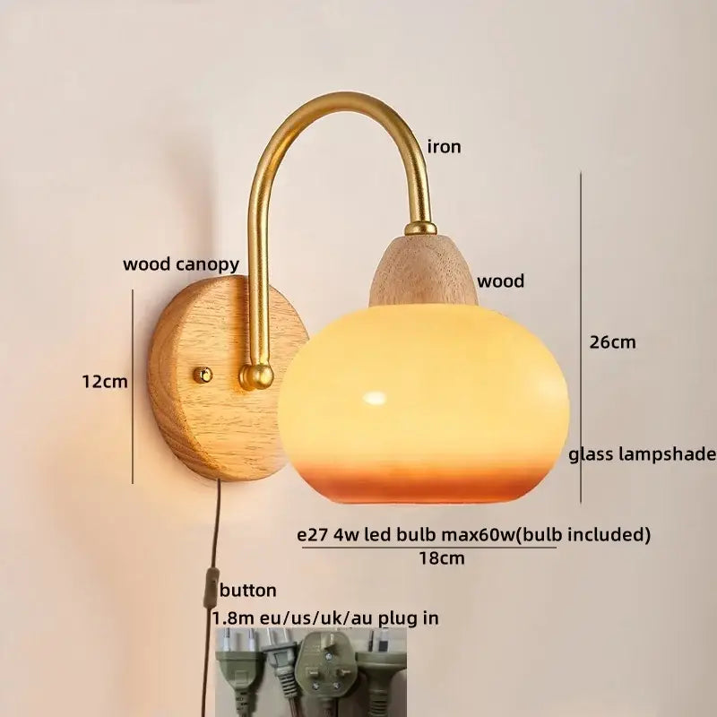 A warm-toned glass lampshade wall light with brass iron arm and wooden canopy from decorbites led pull chain series