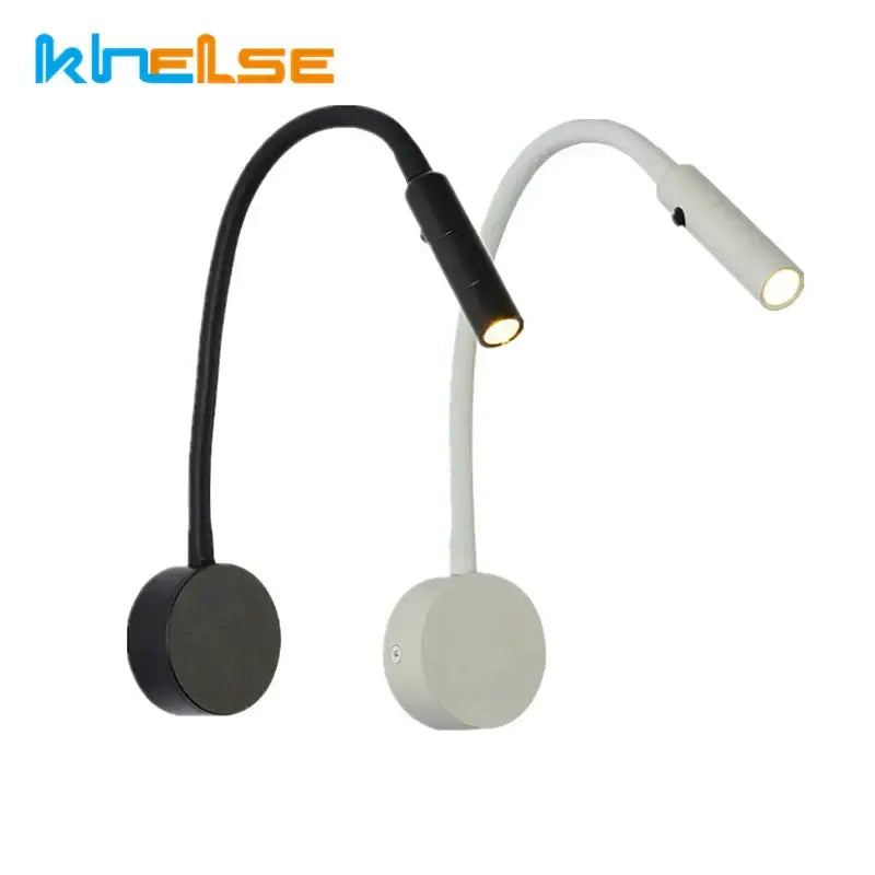 Black and white DecorBites LED reading wall lamps with flexible gooseneck and circular bases for bedroom study use