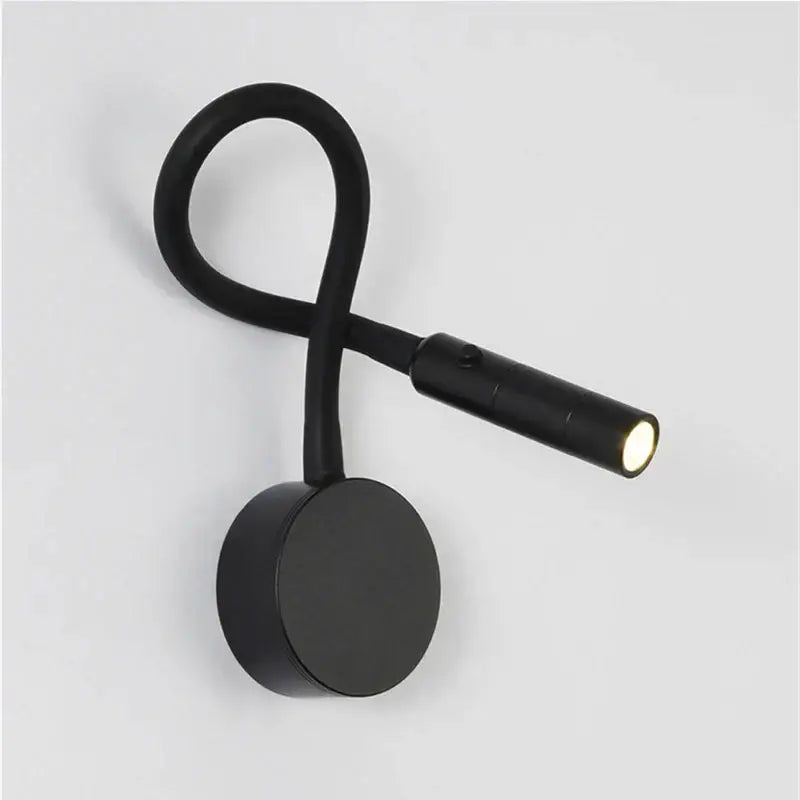 Black flexible gooseneck wall lamp with circular base and adjustable led head decorbites led reading wall light