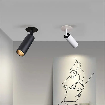 Two modern decorbites led recessed ceiling lights in matte black and white with sleek cylindrical design for kitchen use