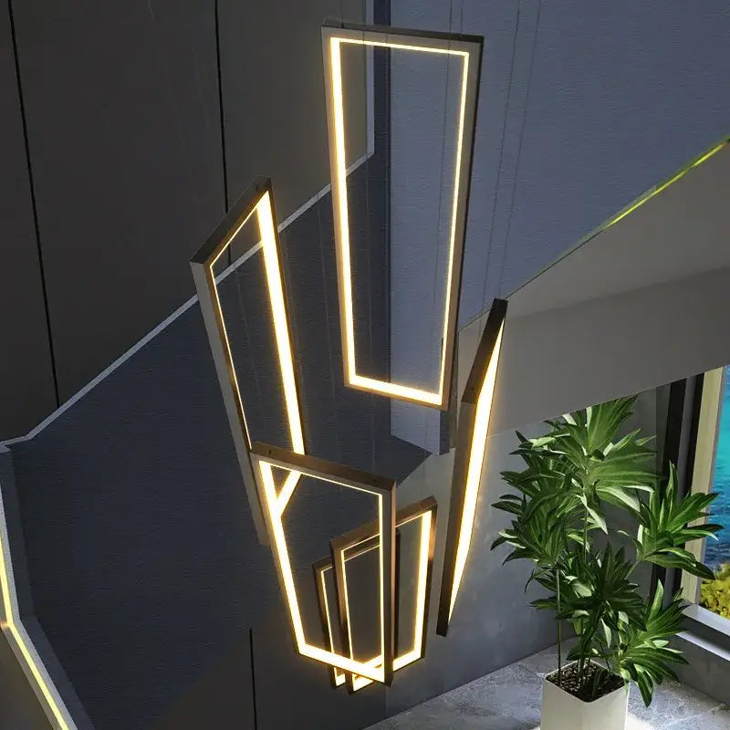 Modern geometric pendant lighting with decorbites led rectangle illuminated in warm golden glow for staircase decor
