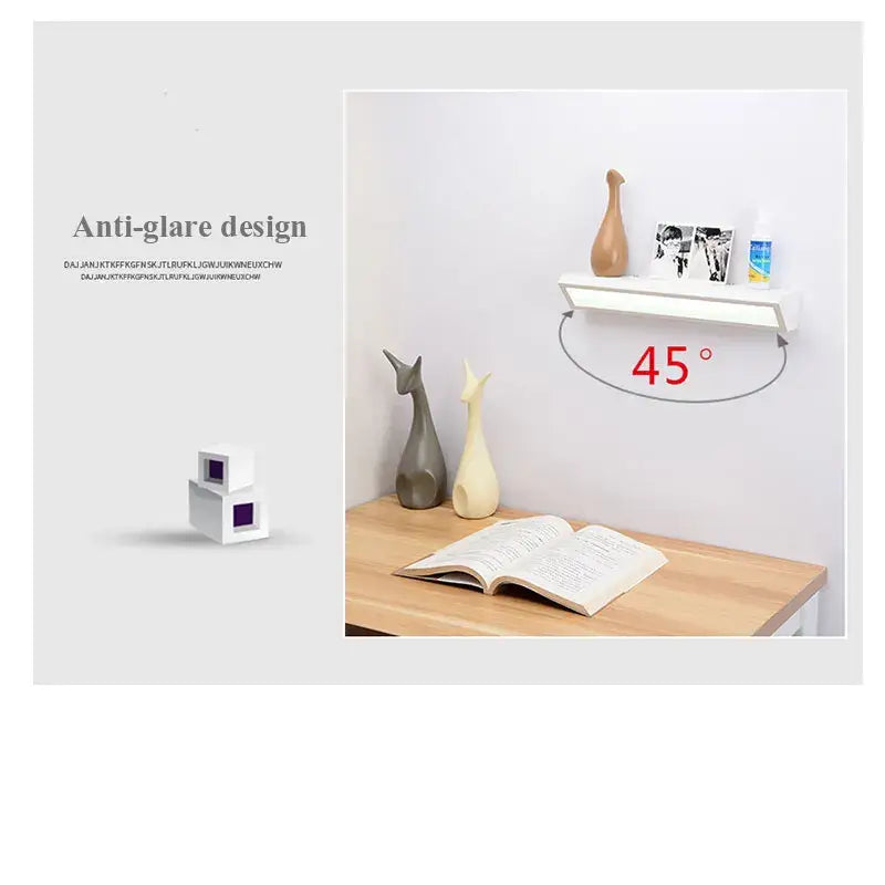 White wall-mounted shelf with 45-degree angle holding decor items beside decorbites led rectangle wall lamp