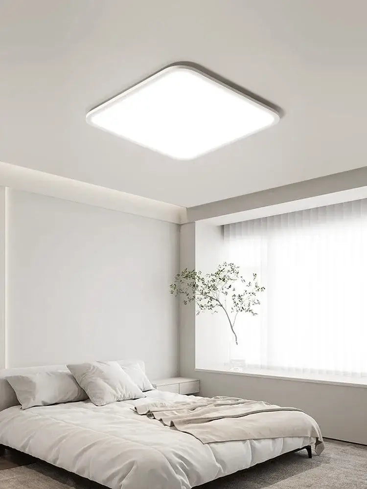 Modern white decorbites led rectangular ceiling light with sleek diffuser and minimalist metallic frame for living rooms