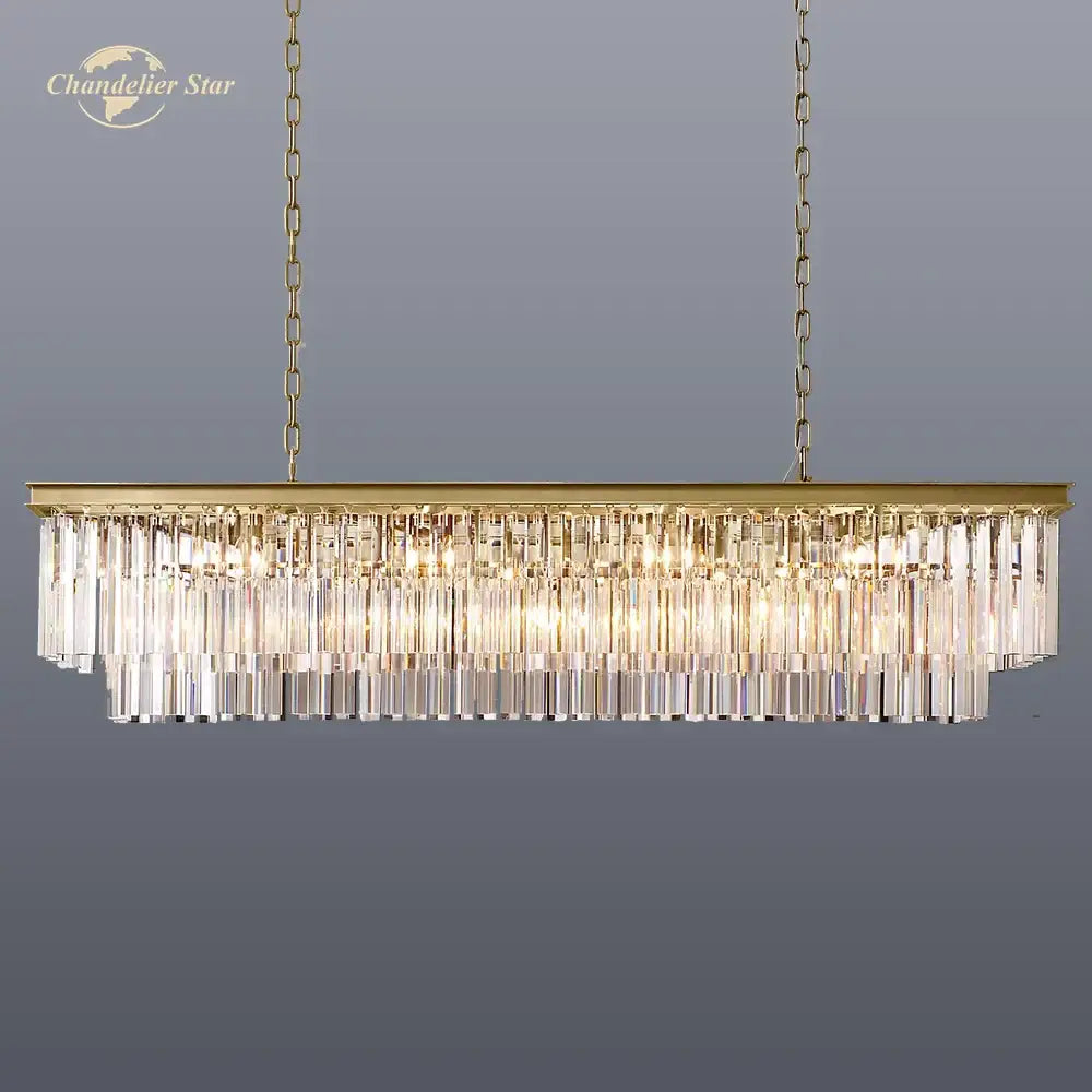 Gold-toned DecorBites led rectangular crystal chandelier with cascading clear prisms for dining or kitchen island lighting