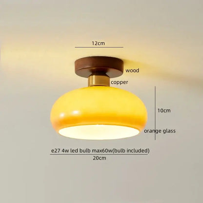 Warm yellow-orange glass dome ceiling light fixture with wooden and copper base by DecorBites LED resin for porch use