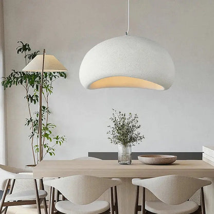 White textured DecorBites LED restaurant pendant light with a curved dome shape and warm interior glow for home decor