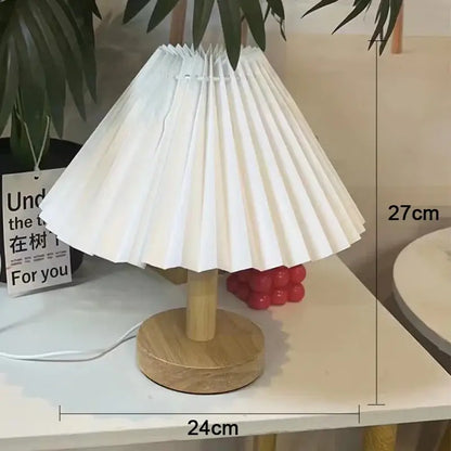 White pleated paper lampshade with wooden base on decorbites led retro table lamp for interior lighting