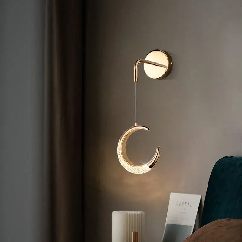 A sleek gold-toned crescent moon lamps set wall sconce with minimalist design and led ring from decorbites lighting collection
