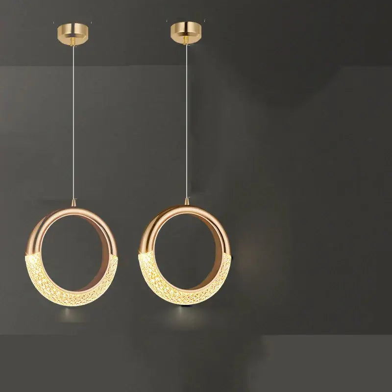 Two modern gold-toned decorbites led ring and moon lamps set pendant lights with textured acrylic and alloy design emitting warm glow