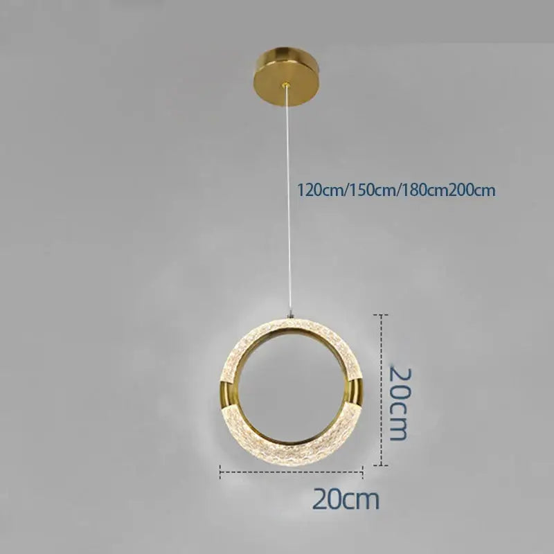 Gold-toned pendant light with textured crystal-encrusted ring and polished brass accents from decorbites™ led ring and moon lamps set