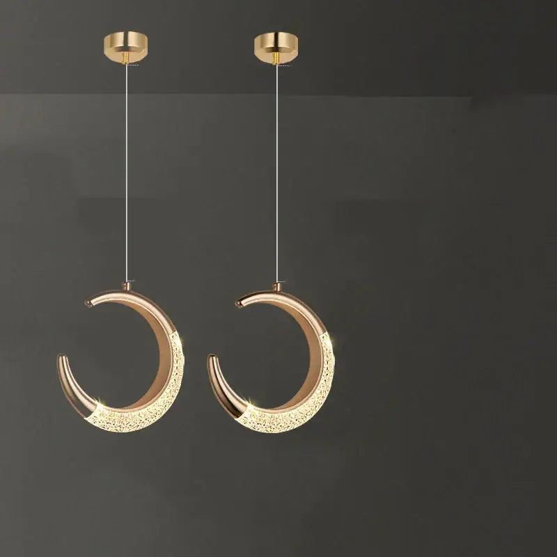 Two elegant gold-toned crescent moon pendant lights with crystal accents from decorbites led ring and moon lamps set