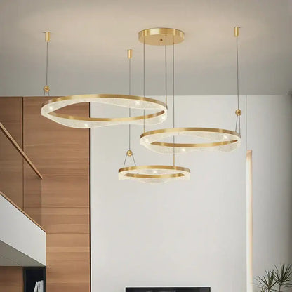 Modern gold-toned led ring pendant chandelier with mesh design and embedded led lighting for living and dining rooms