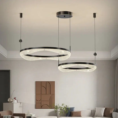 Modern black and clear crystal decorbites™ led ring pendant chandelier with sleek circular design for living and dining room