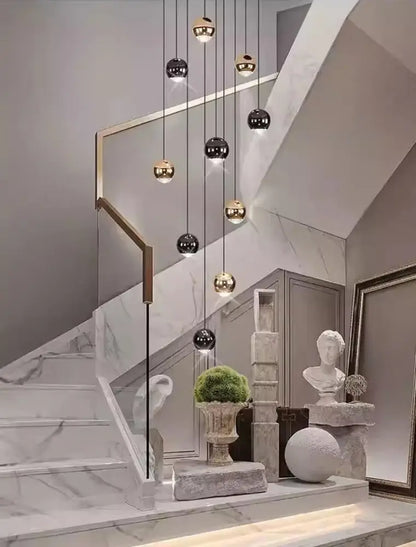 A modern DecorBites™ LED ring pendant light with spherical gold and black heads size diameter for stylish home decor