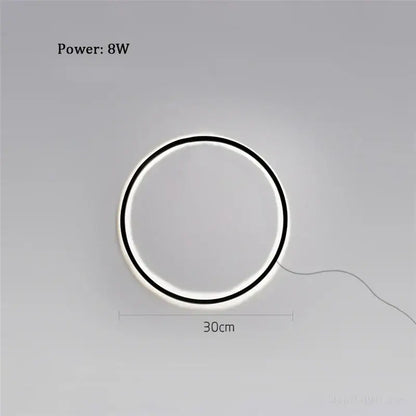 Decorbites™ led ring wall lamp with a sleek black rim and glowing white inner ring, minimalist wall lamp for living room decor