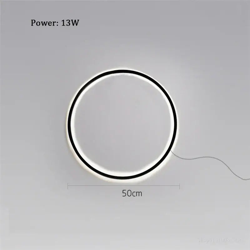 Decorbites™ led ring wall lamp with sleek black frame and glowing white illumination ideal for minimalist living room decor