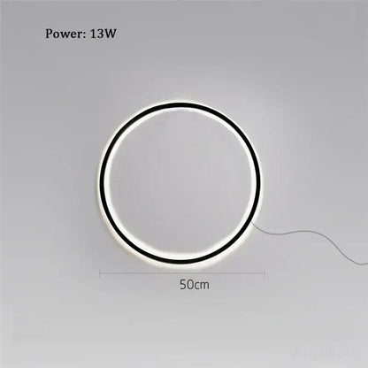 Decorbites™ led ring wall lamp with sleek black frame and glowing white illumination ideal for minimalist living room decor