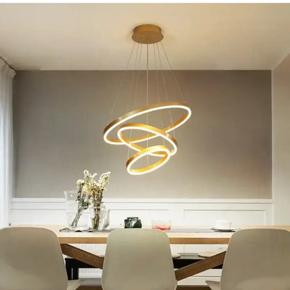 Gold-toned modern pendant decorbites™ led rings ceiling chandelier with three interlocking circular rings for home decoration