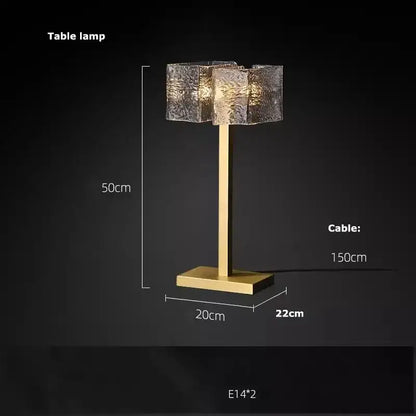Gold-toned table lamp with textured translucent glass shade from decorbites led ripples glass chandelier collection