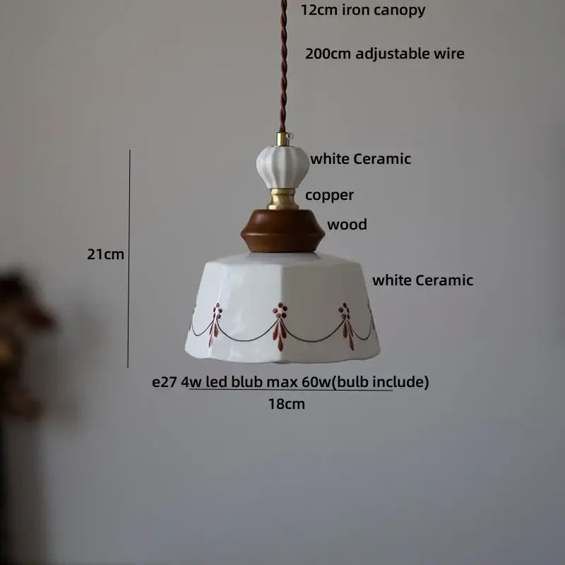 White ceramic led rose flower pendant lamp with fluted scalloped design and brown floral motifs by DecorBites