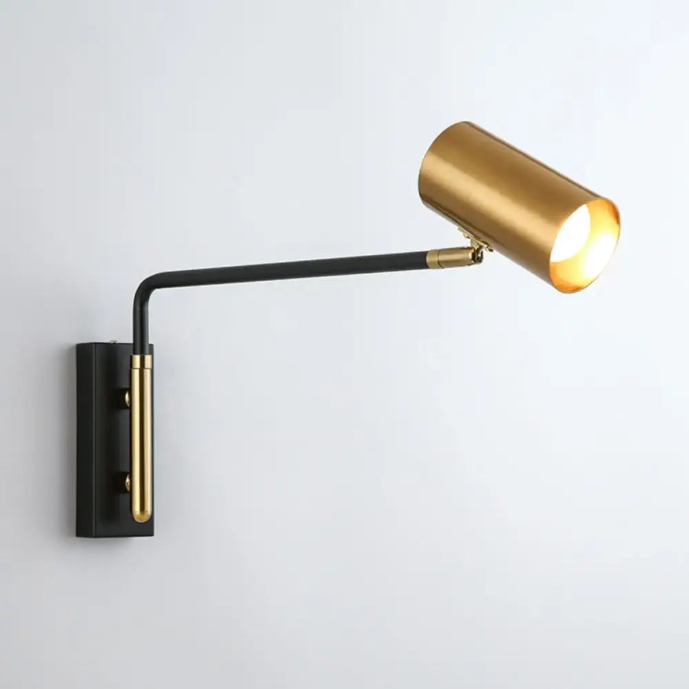 Gold-finished cylindrical wall lamp with black articulated arm and mounting plate led rotatable wall lamp by DecorBites