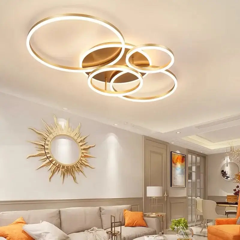 Modern gold-toned led round ceiling chandelier with overlapping rings for living room bedroom and restaurant lighting