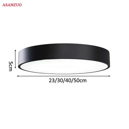 Decorbites™ led round ceiling light with sleek matte black finish and white illuminated center for modern interiors