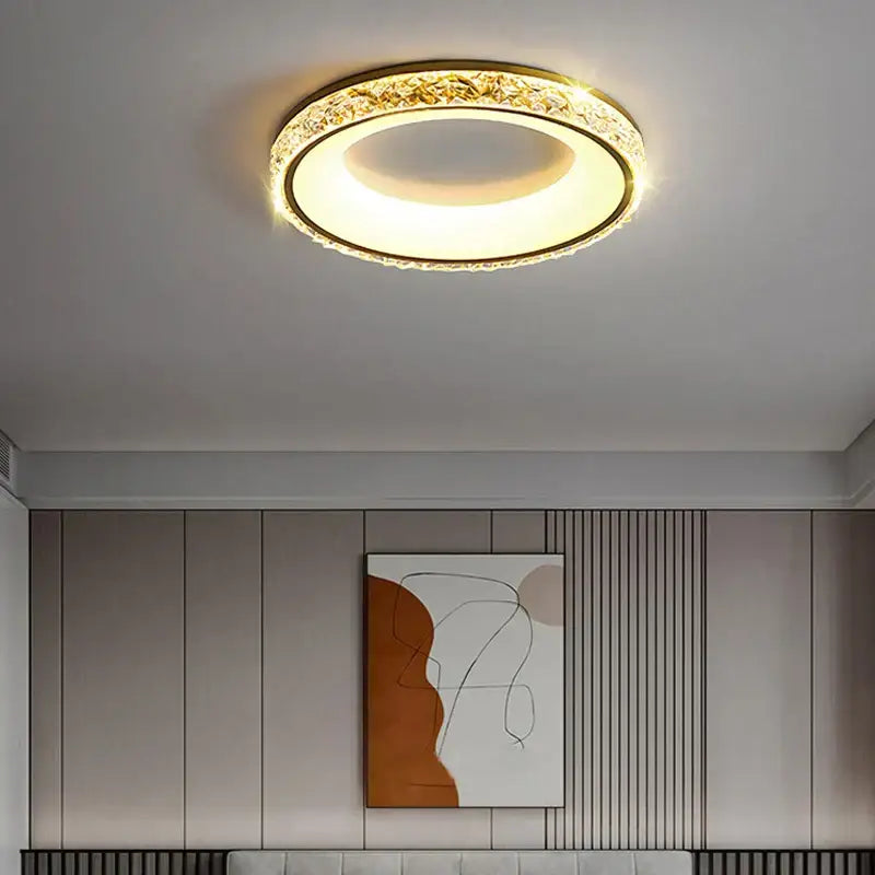 Gold-toned DecorBites™ LED round ceiling light with crystal-encrusted ring and remote control for bedroom and living room
