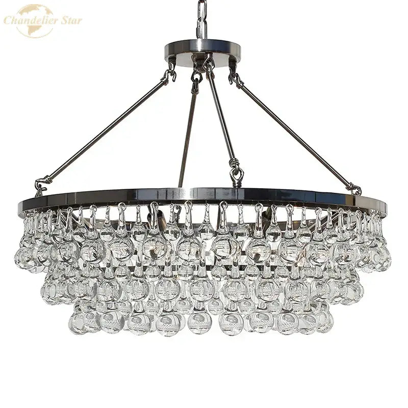 Chrome-finished decorbites led round glass chandelier with clear teardrop crystals pendant lights for modern living spaces
