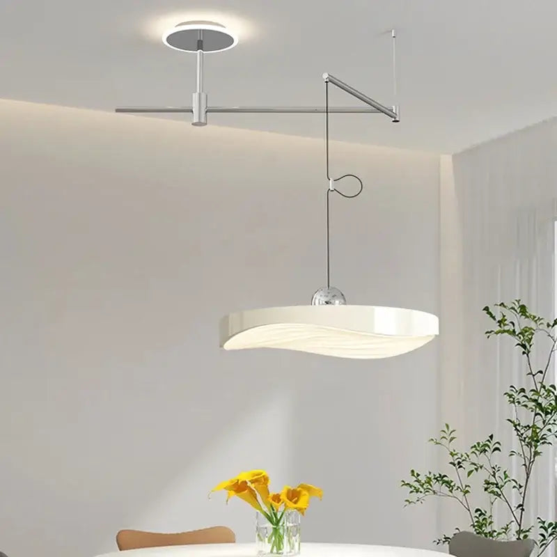 Modern white decorbites led saucer chandelier with sleek curved design and metallic arm for dining room and office lighting