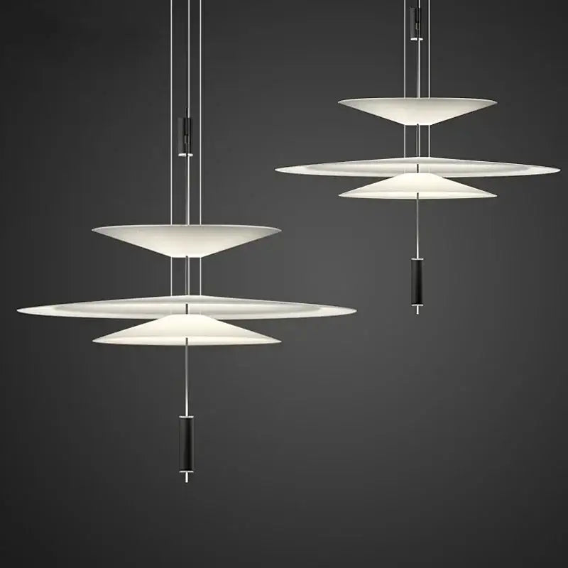 Modern white led saucer chandelier with sleek black cylindrical accents for living room and dining table decor
