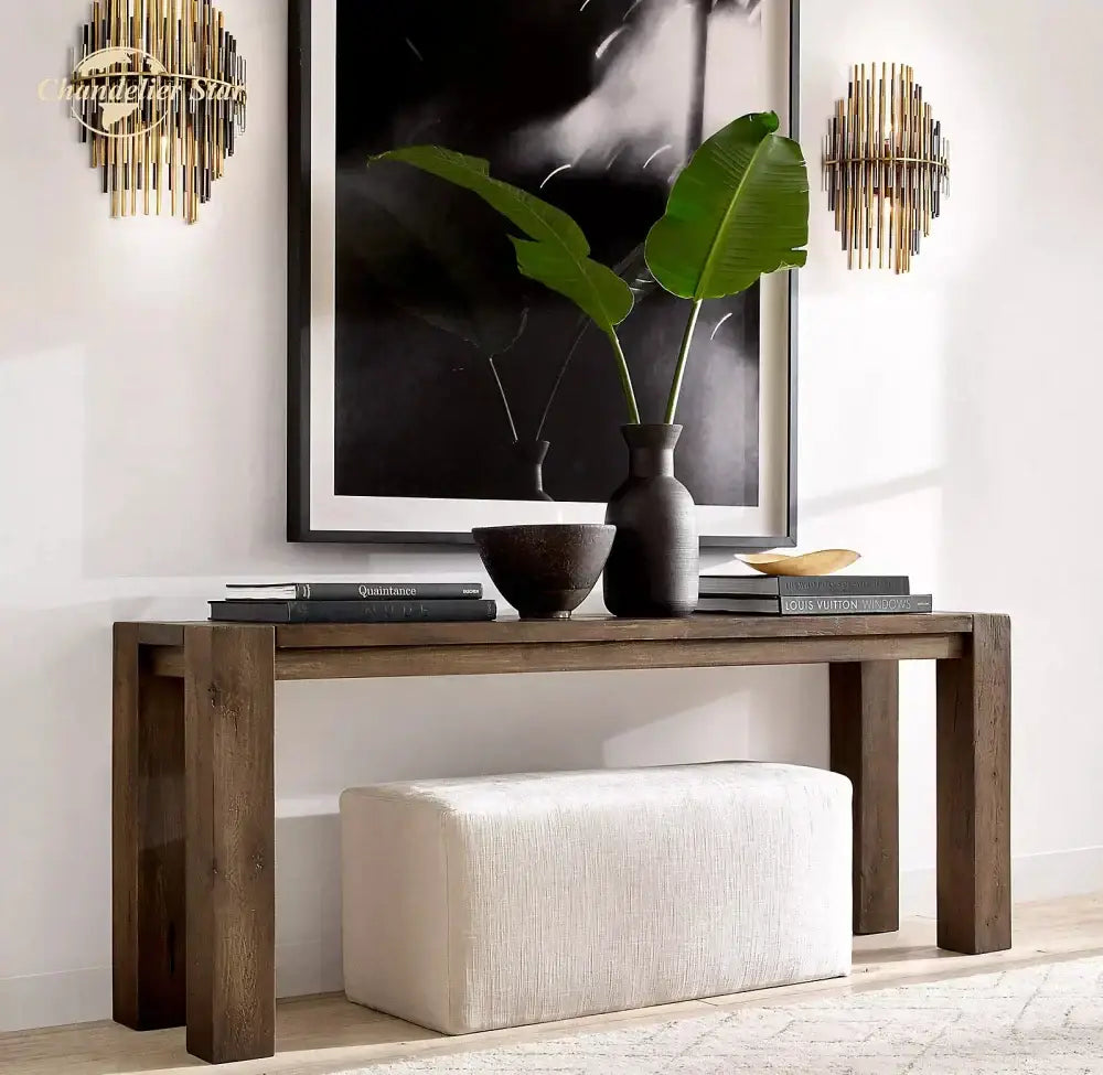 Dark brown wooden console table with textured white fabric ottoman below decorbites led sconce lamp wall lighting