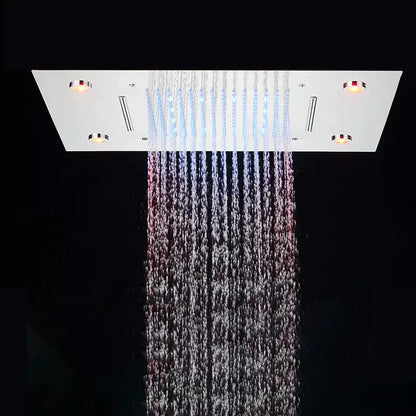 Modern rectangular chrome shower faucet with led lighting casting blue pink and white glow by decorbites led shower
