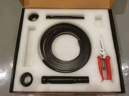 Black coiled inspection camera cable set with red scissors and accessories in foam packaging for decorbites led skyline steel pendant lights