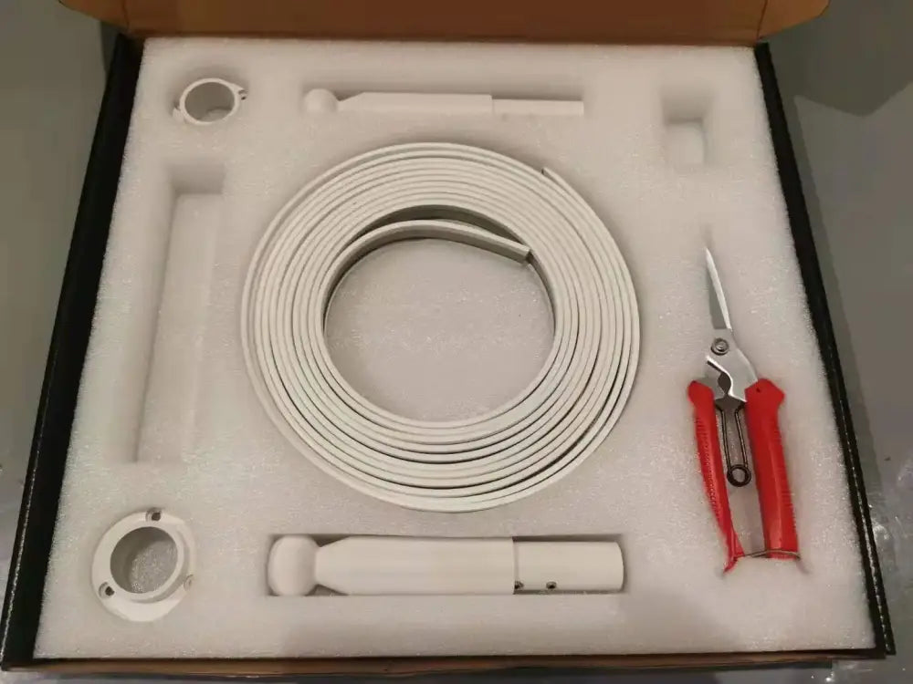 White coiled cable and tools neatly arranged in foam-lined box for DecorBites led skyline steel pendant lights installation
