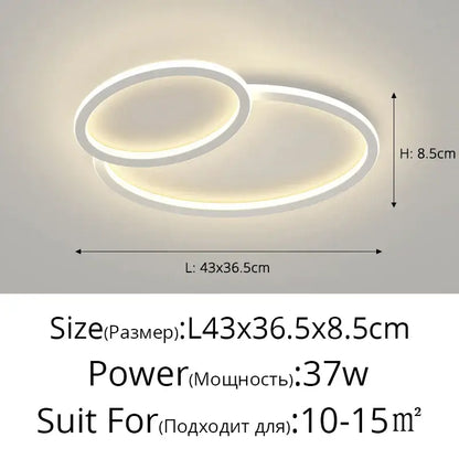 Modern white DecorBites LED smart chandelier with two interlocking oval rings emitting warm glow for bedroom lighting