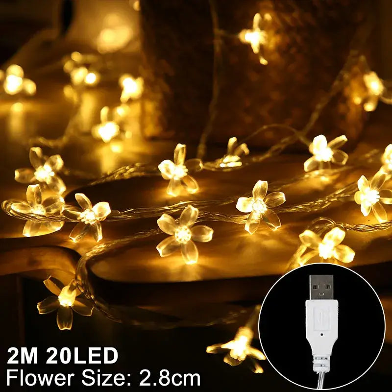 Warm golden led snowflake christmas lights with delicate translucent plastic flowers for snowflake christmas home decor