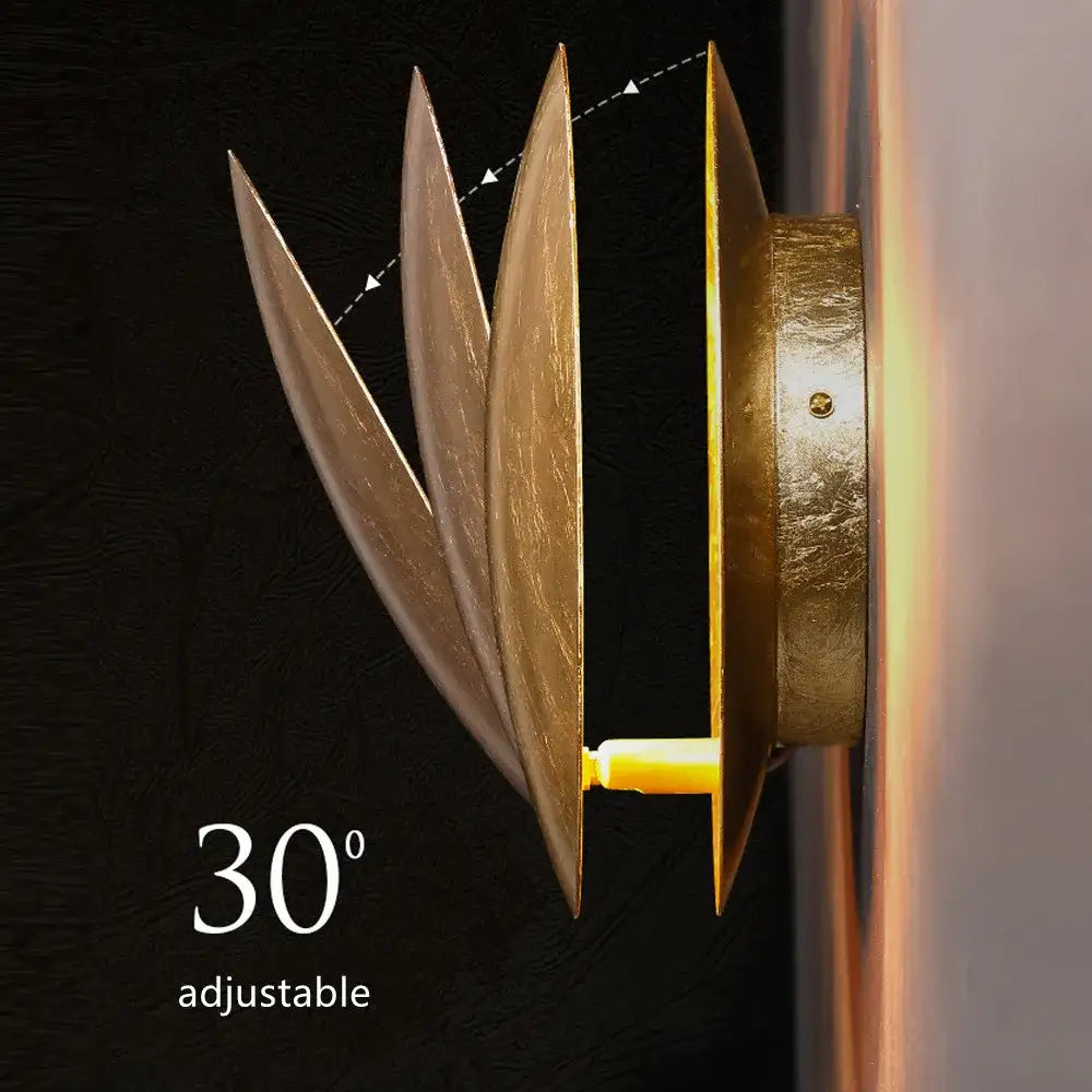 Gold-toned decorbites led solar eclipse wall lamp with sleek leaf design and adjustable 30-degree angle for modern lighting