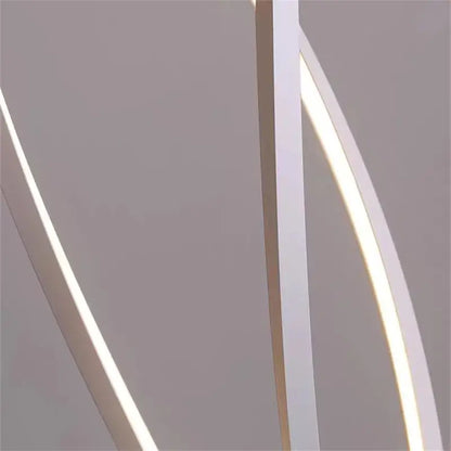 Modern white LED spiral aluminum light fixture with sleek curved design from DecorBites for home and office decor