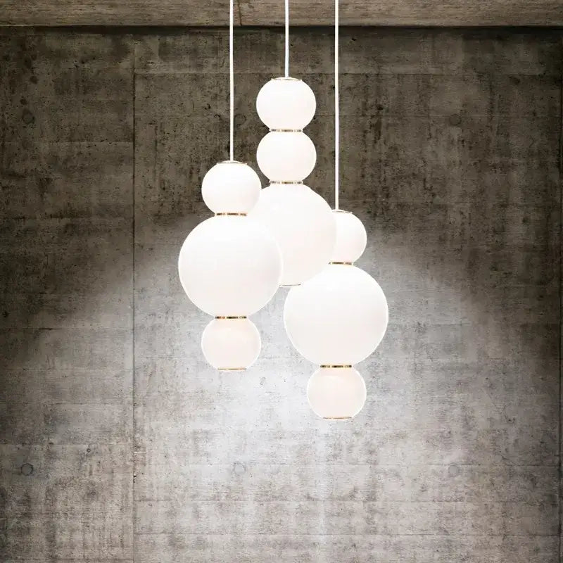 White spherical glass decorbites led spiral ball pendant with gold-toned metal accents for modern lighting decor