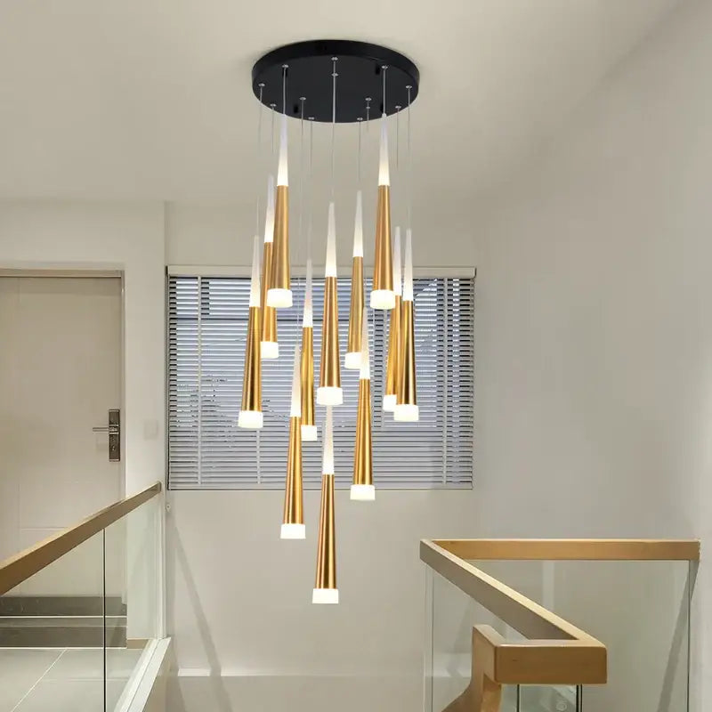 Modern gold and white decorbites led spiral chandelier with circular black ceiling mount for stairwell lighting