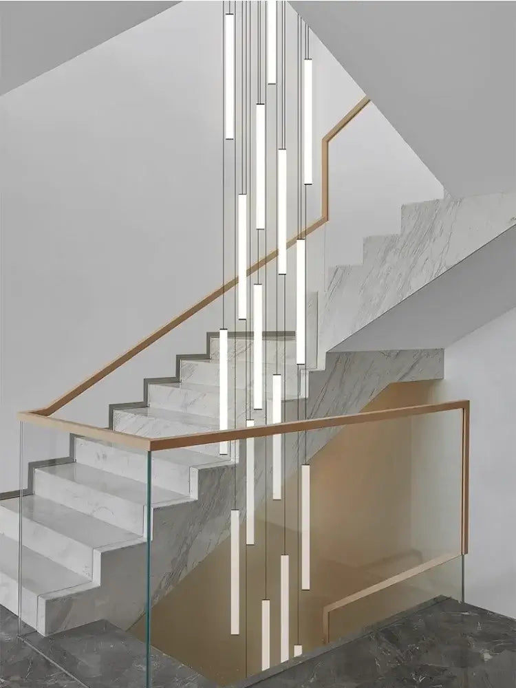 Modern minimalist white marble spiral staircase with glass balustrade and wooden handrail featuring led spiral staircase chandelier