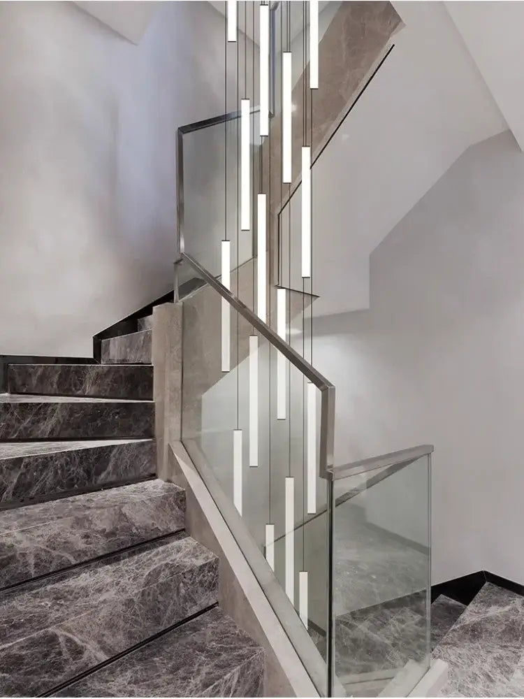 DecorBites™ led spiral staircase chandelier with slender rectangular led tubes in a cascading modern minimalist design