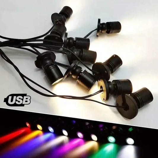Black usb-powered decorbites led spotlight with adjustable color settings and sleek cylindrical design for cabinets