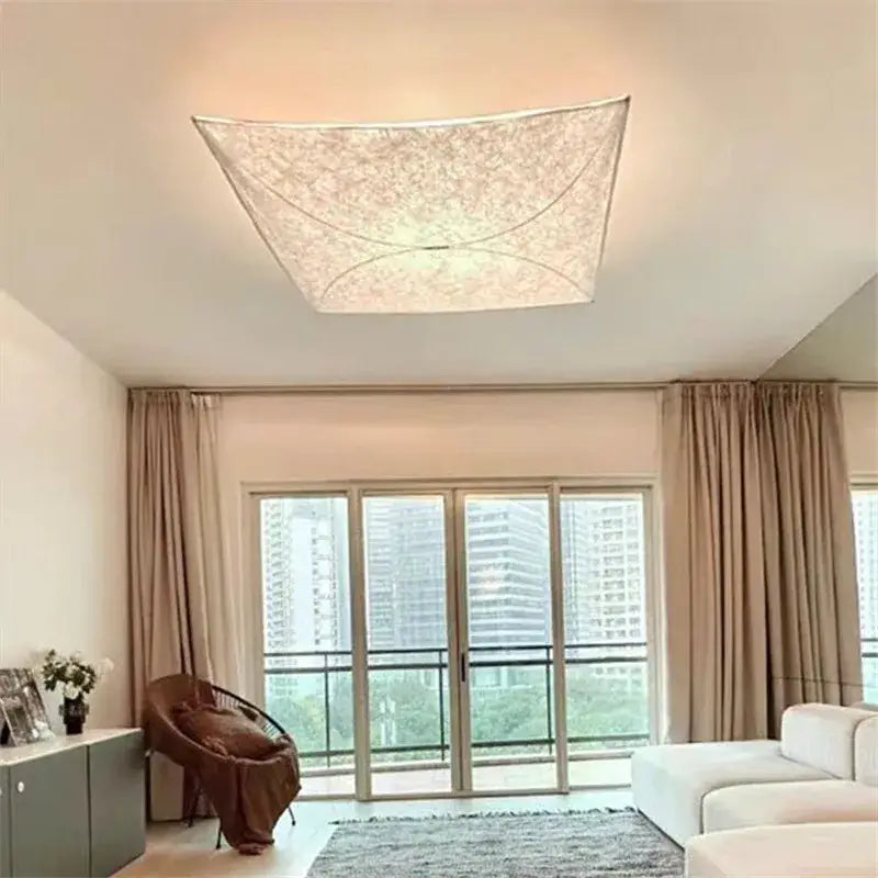 A decorbites led square fabric wall lamp with a delicate lace-like pattern and warm ambient glow for living spaces