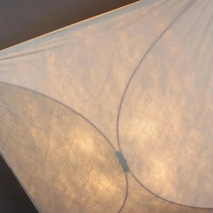 A cream translucent fabric canopy with stitched seams and golden lighting for decorbites led square wall lamp