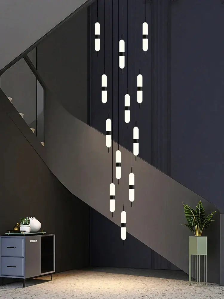 Modern minimalist decorbites led staircase chandelier with black and white cylindrical shades for staircase chandelier ceiling lighting