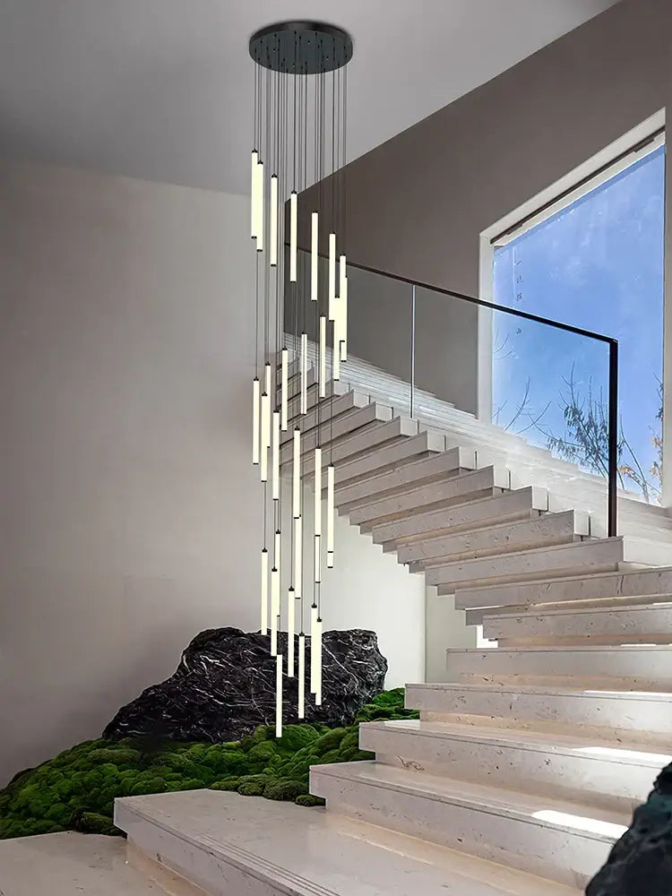 Modern minimalist decorbites led staircase chandelier with slender vertical light tubes and black circular ceiling fixture