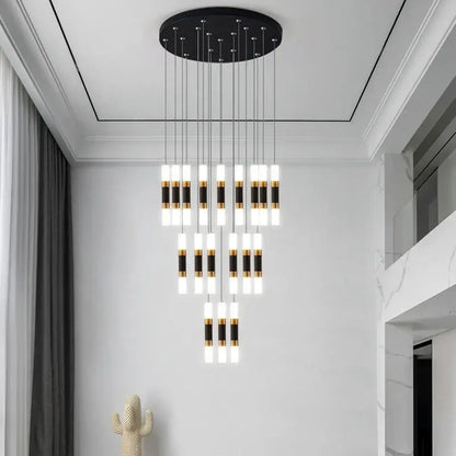 Modern black and gold cylindrical led staircase chandelier with circular ceiling mount for duplex home lighting