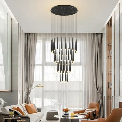 Black modern decorbites led staircase chandelier with circular top and cascading cylindrical lights for luxury interiors